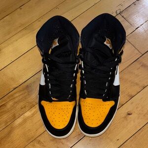 Black and yellow High-Top Jordan 1’s